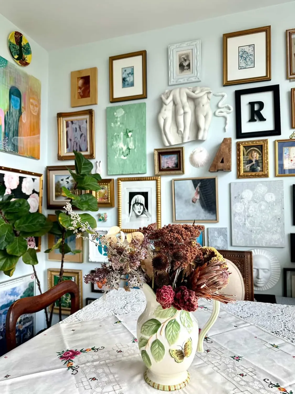 A styled interior with art chosen through Curio Atelier